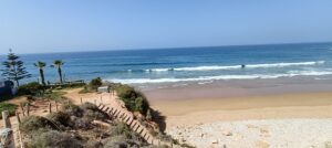 Why are tourists attracted to surf in Agadir Morocco ?